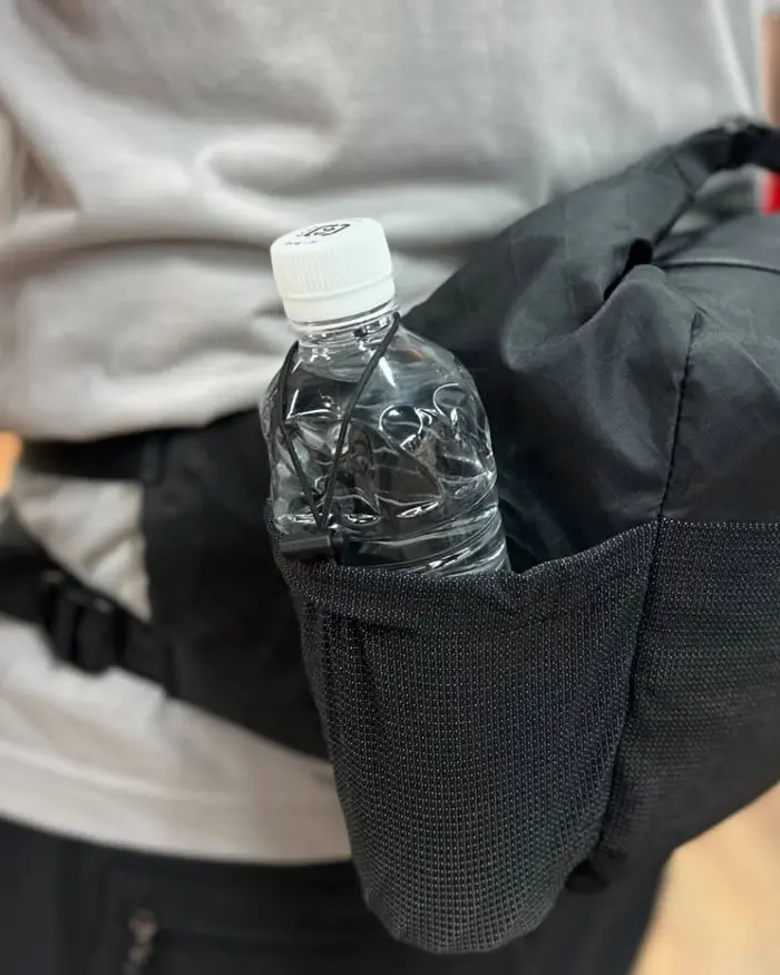 The adjustment system ensures the bag stays stable while the person is moving.